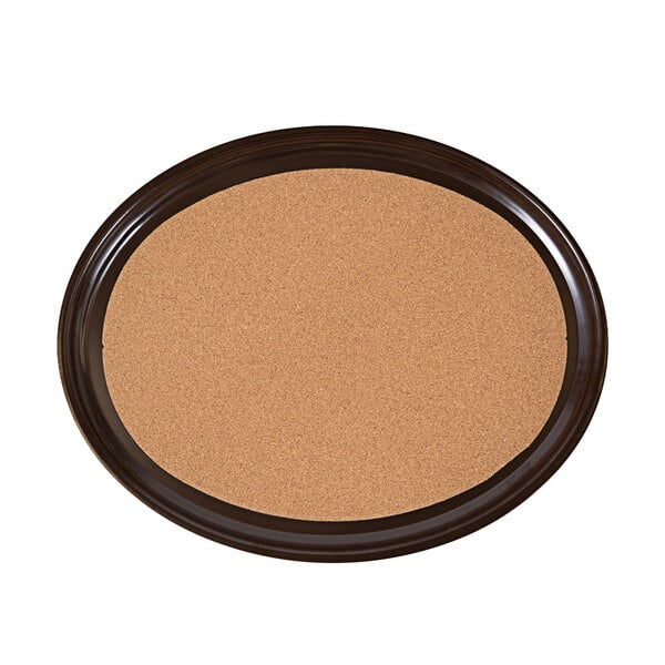 A white oval cork-lined serving tray with a brown rim.