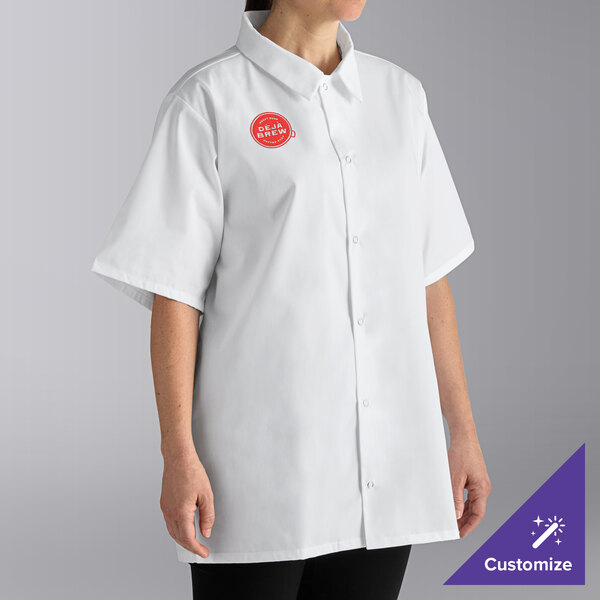 A woman wearing a white Uncommon Chef cook shirt.