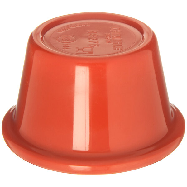 A sunset orange Carlisle smooth melamine ramekin.