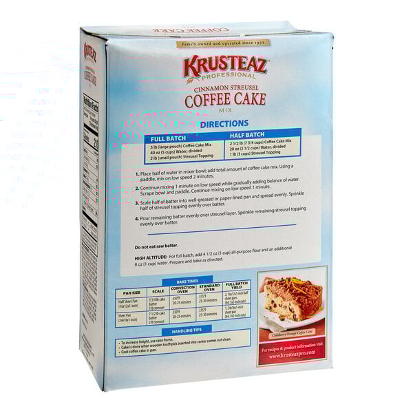 A box of Krusteaz Cinnamon Streusel Coffee Cake Mix with a piece of cake on the front.