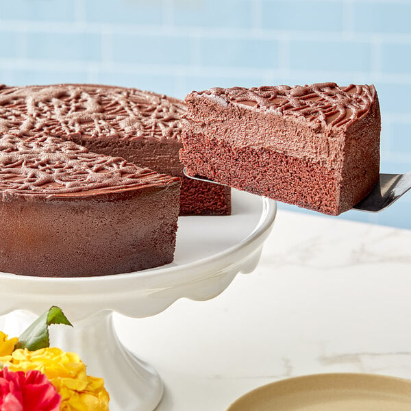 A slice of Krusteaz Devil's Food cake on a white plate.