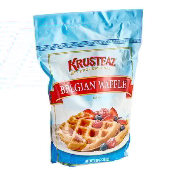 A blue bag of Krusteaz Belgian Waffle Mix.