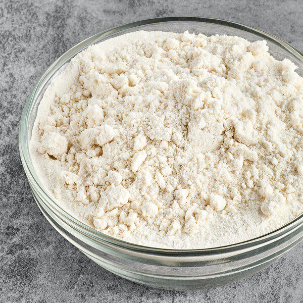 A bowl of Krusteaz Belgian Waffle Mix powder.