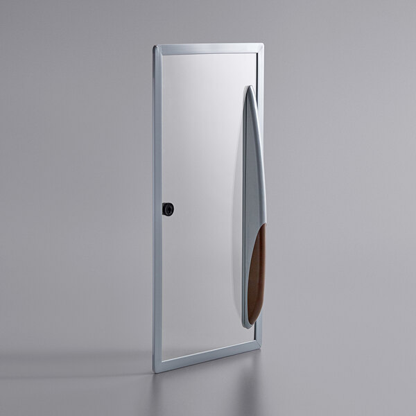 A close-up of the Avantco sliding glass bottom lid for a freezer.