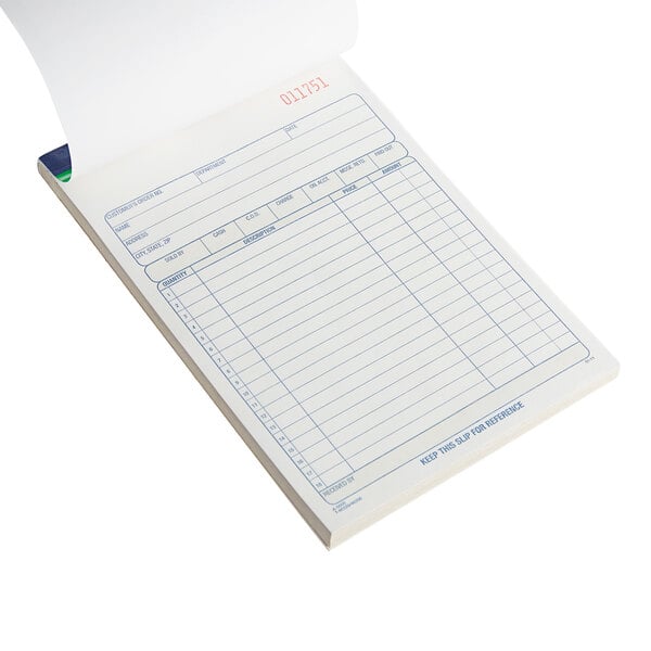 An Adams carbonless bound sales order book with white pages and blue lines.