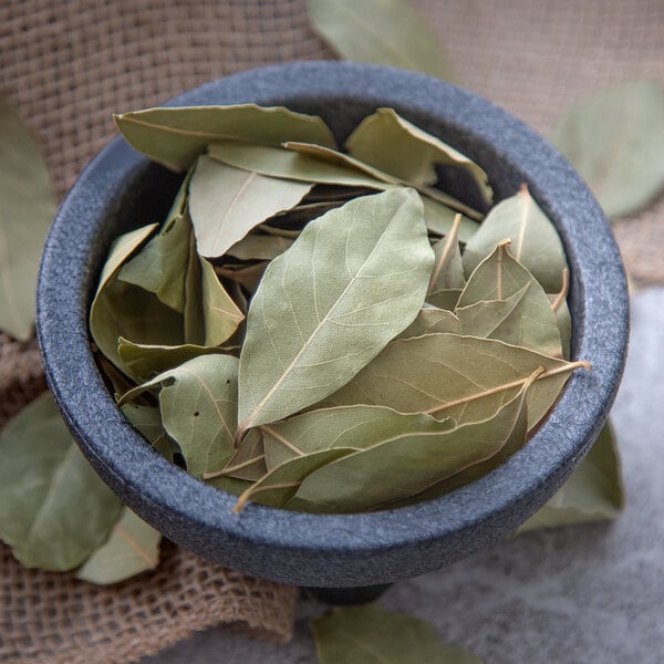 Whole bay leaves in a bowl