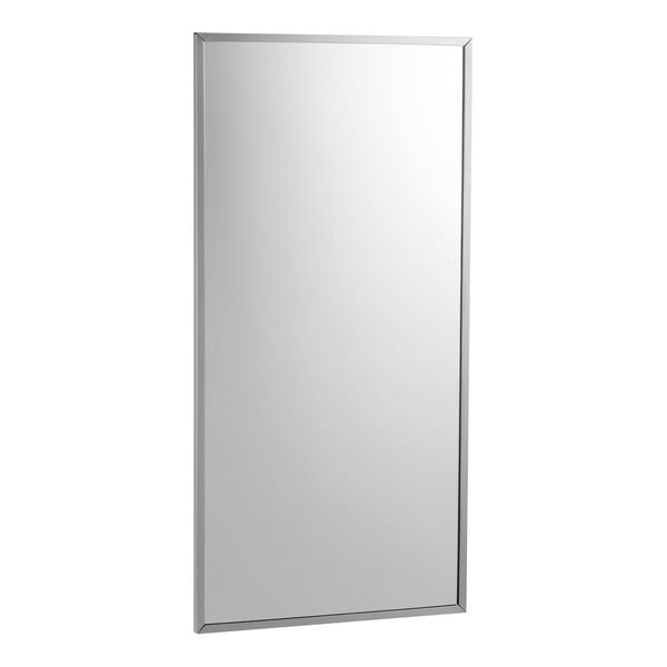 A rectangular mirror with a silver frame.