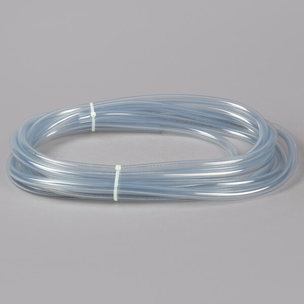 A clear plastic tube with a white plastic tip.