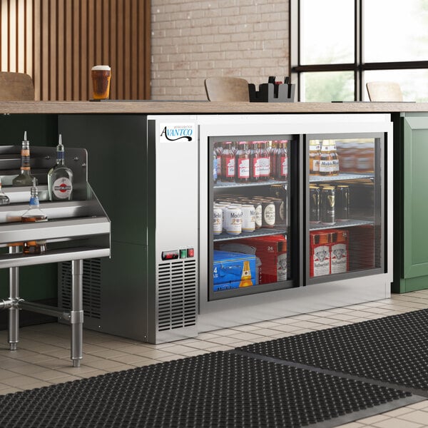 An Avantco back bar refrigerator with drinks inside.