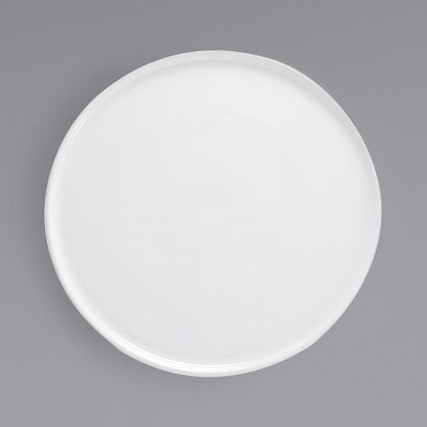 A white plate on a white background.