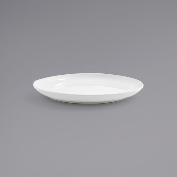 A white Front of the House Harmony porcelain plate on a gray background.