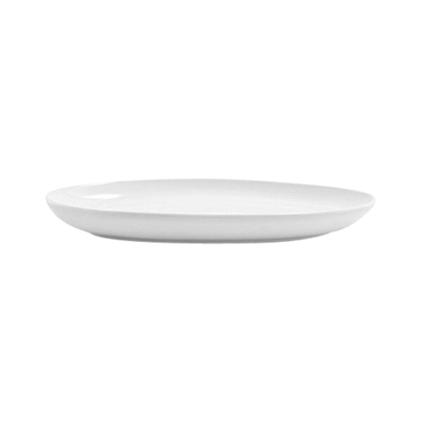 A bright white oval porcelain plate with a coupe design.