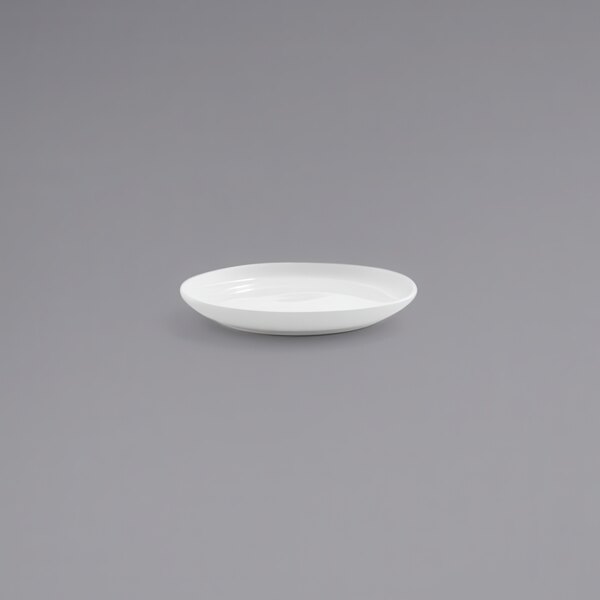 A close up of a white Front of the House Harmony porcelain plate.