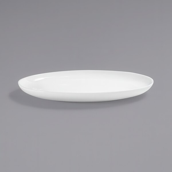 A white oval plate on a gray background.