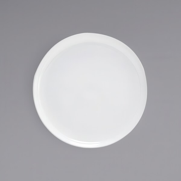 A white plate with a circular rim.