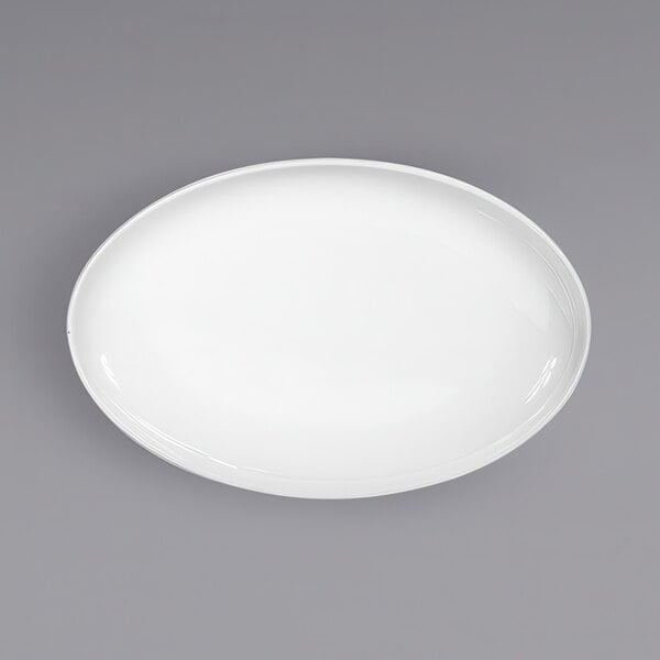 A white oval plate on a gray background.