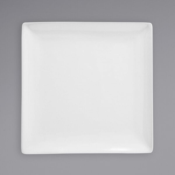 A Front of the House bright white square porcelain plate.