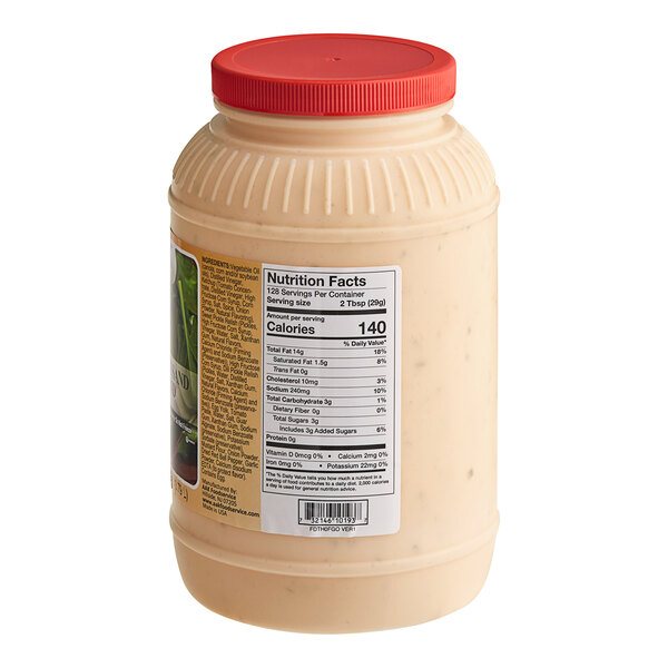 A plastic container of AAK Select Recipe Thousand Island Dressing with a label on it.