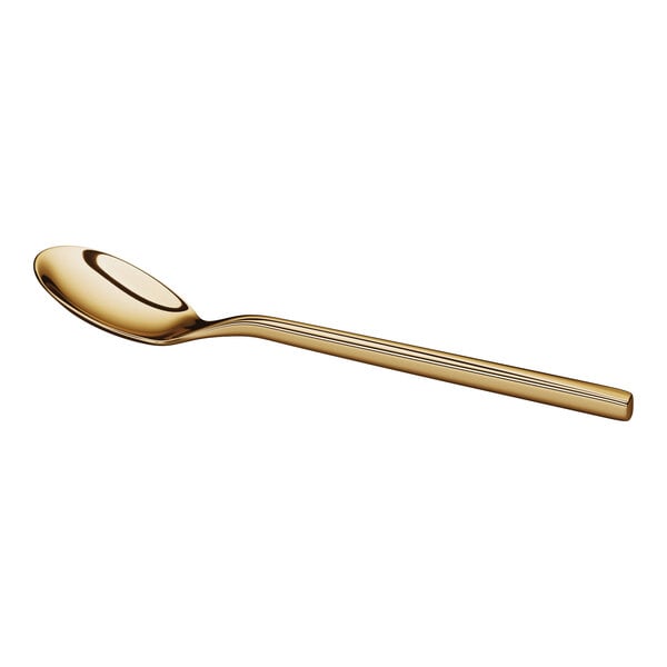 A gold-colored metal spoon with a smooth, rounded handle and a shallow bowl, shown on a white background.