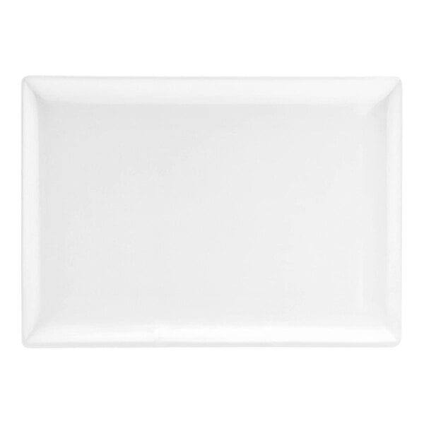 A rectangular bright white porcelain plate measuring 7 by 5 inches.