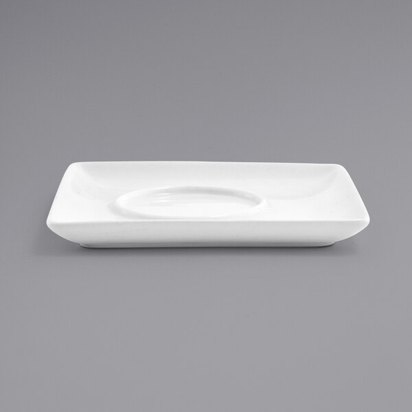 A white rectangular Front of the House porcelain saucer with a circular shape in the middle.