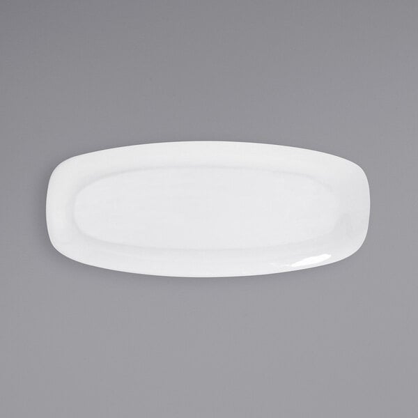 a white rectangular plate on a gray background