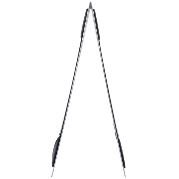 A long shot of a Menu Solutions Alumitique aluminum menu tent with black and silver picture corners.