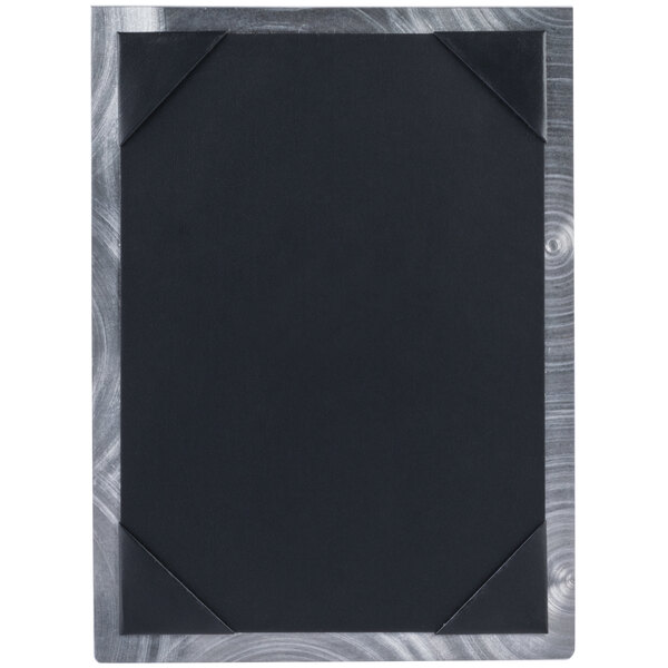 A black rectangular Menu Solutions aluminum table tent with white border corners.