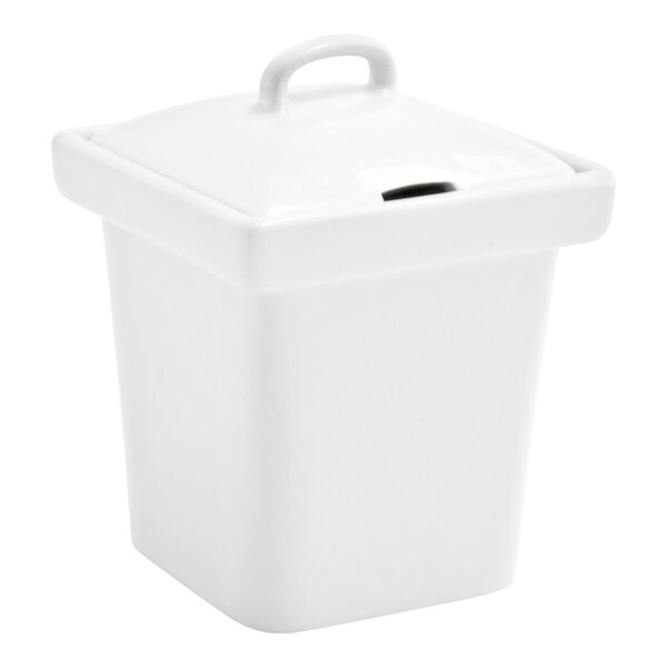 A small, square, bright white porcelain pot with a notched lid and handle.