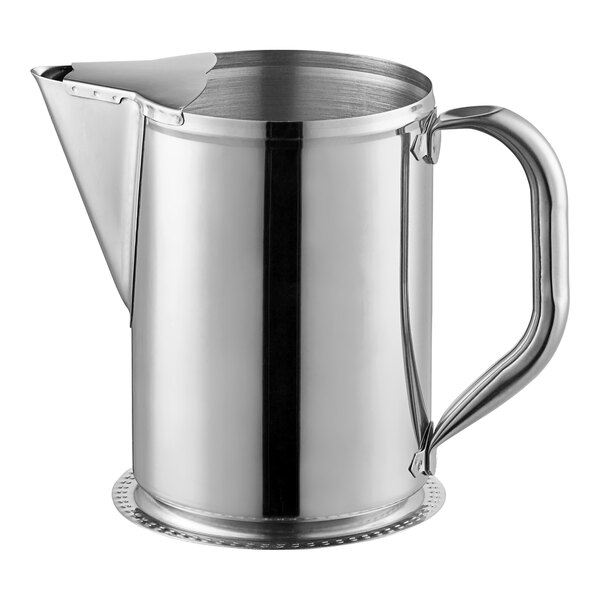 A silver metal Vollrath stainless steel water pitcher with a handle.