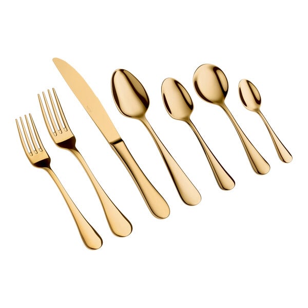 Seven pieces of gold-colored cutlery, including two forks, one knife, and four spoons, are arranged in a row on a white background.