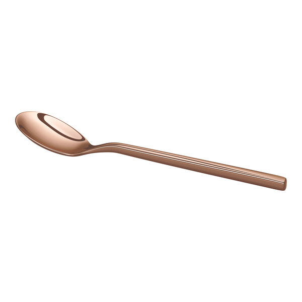 A single rose gold-colored spoon with a rounded bowl and a straight handle is shown against a white background.