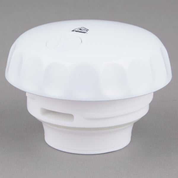 A white plastic lid designed for the Vollrath SwirlServe Tilt & Pour 42 oz. beverage server.