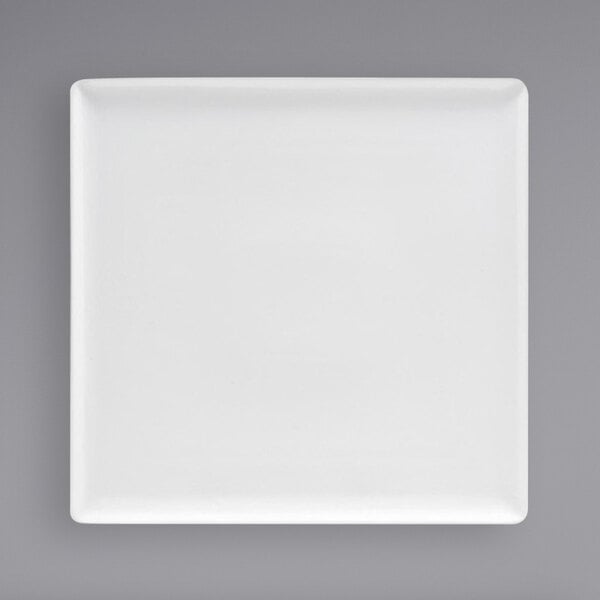 A Front of the House bright white square porcelain plate.