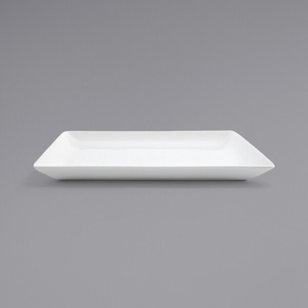 A white rectangular Front of the House porcelain plate on a gray background.