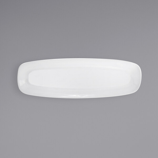 a white plate on a gray background