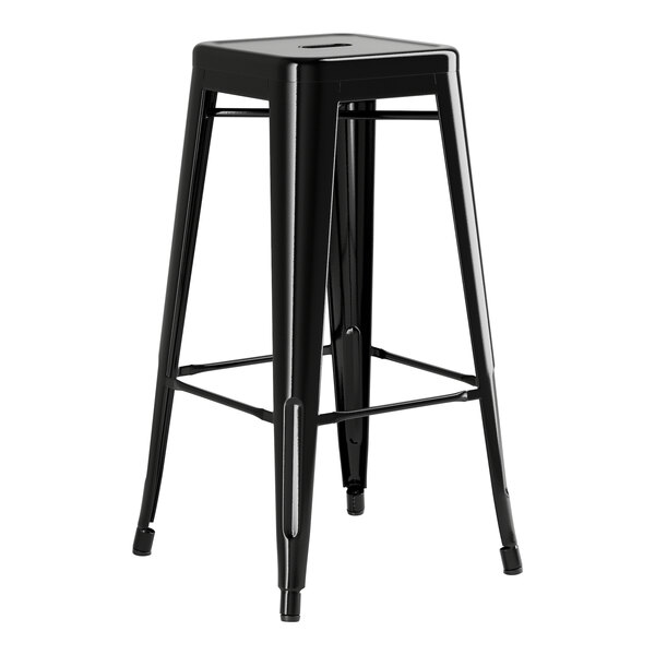 A Lancaster Table & Seating black metal outdoor backless barstool with a black square seat.