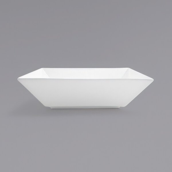 A white square bowl on a gray background.