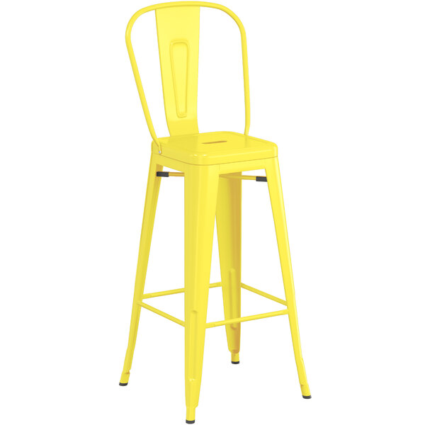 A yellow metal Lancaster Table & Seating barstool with a backrest.