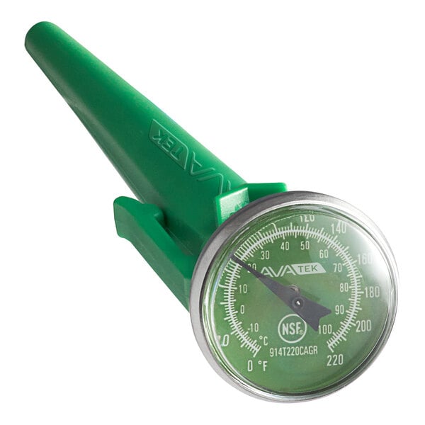 A green dial probe thermometer with a protective sheath and calibration wrench.