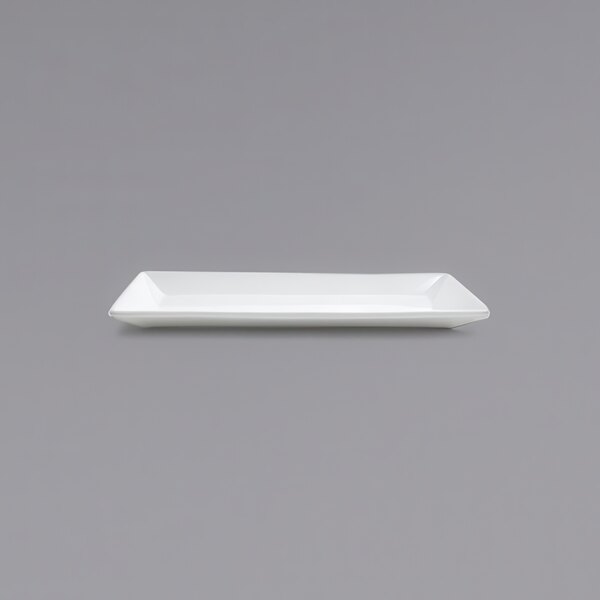 A white rectangular plate on a gray background.