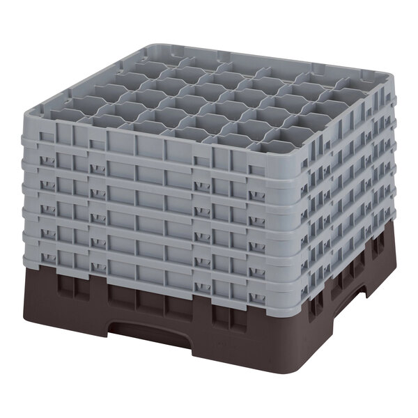 A stack of brown and grey plastic Cambro glass racks.