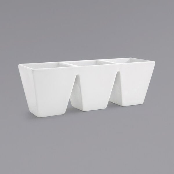 A white rectangular container with three compartments.