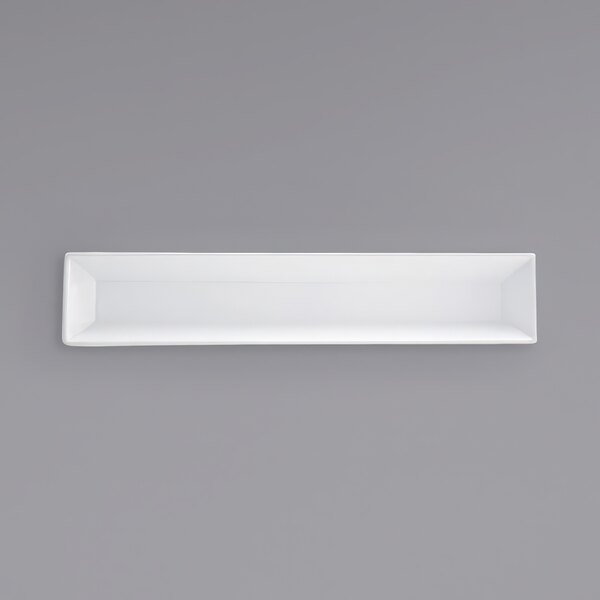 A white rectangular porcelain server from Front of the House with a gray border.