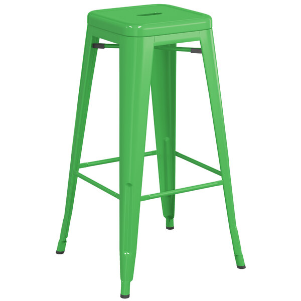 A green Lancaster Table & Seating outdoor barstool with metal legs.