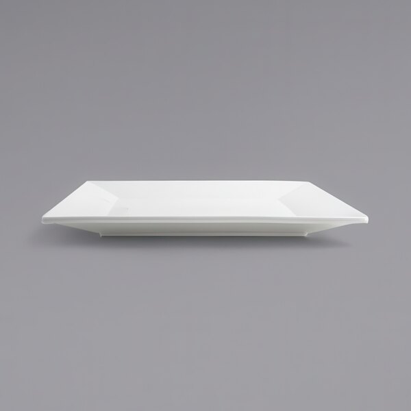 A white square plate on a gray background.