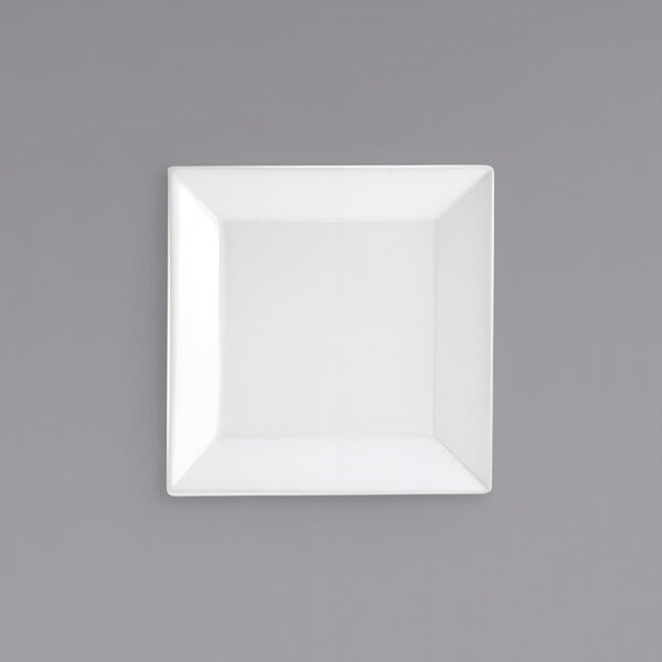 A white square plate on a gray background.