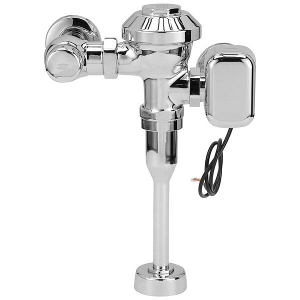 A close-up of a chrome-plated Zurn urinal flush valve.