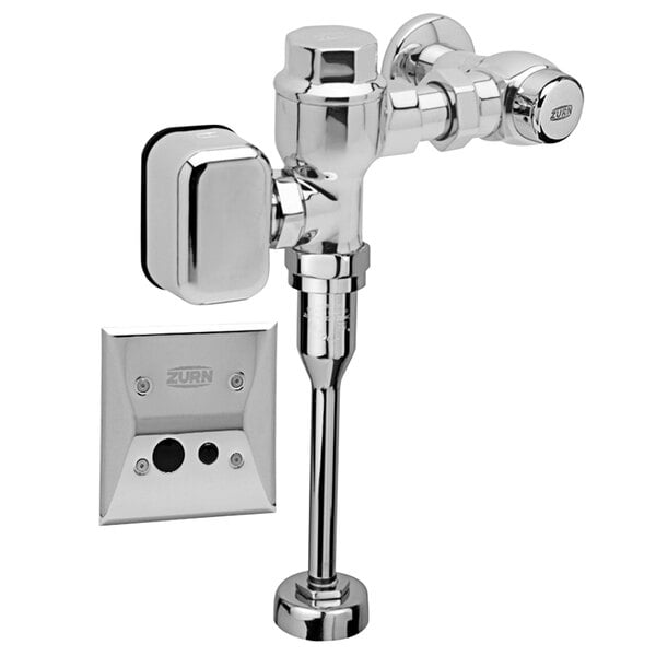 A Zurn chrome-plated urinal flush valve with a wall mounted sensor.