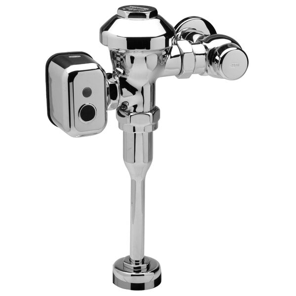 A Zurn chrome urinal flush valve with automatic sensor.